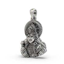 Angled side profile of the Lord Krishna face pendant in 925 sterling silver, highlighting its 3D craftsmanship.