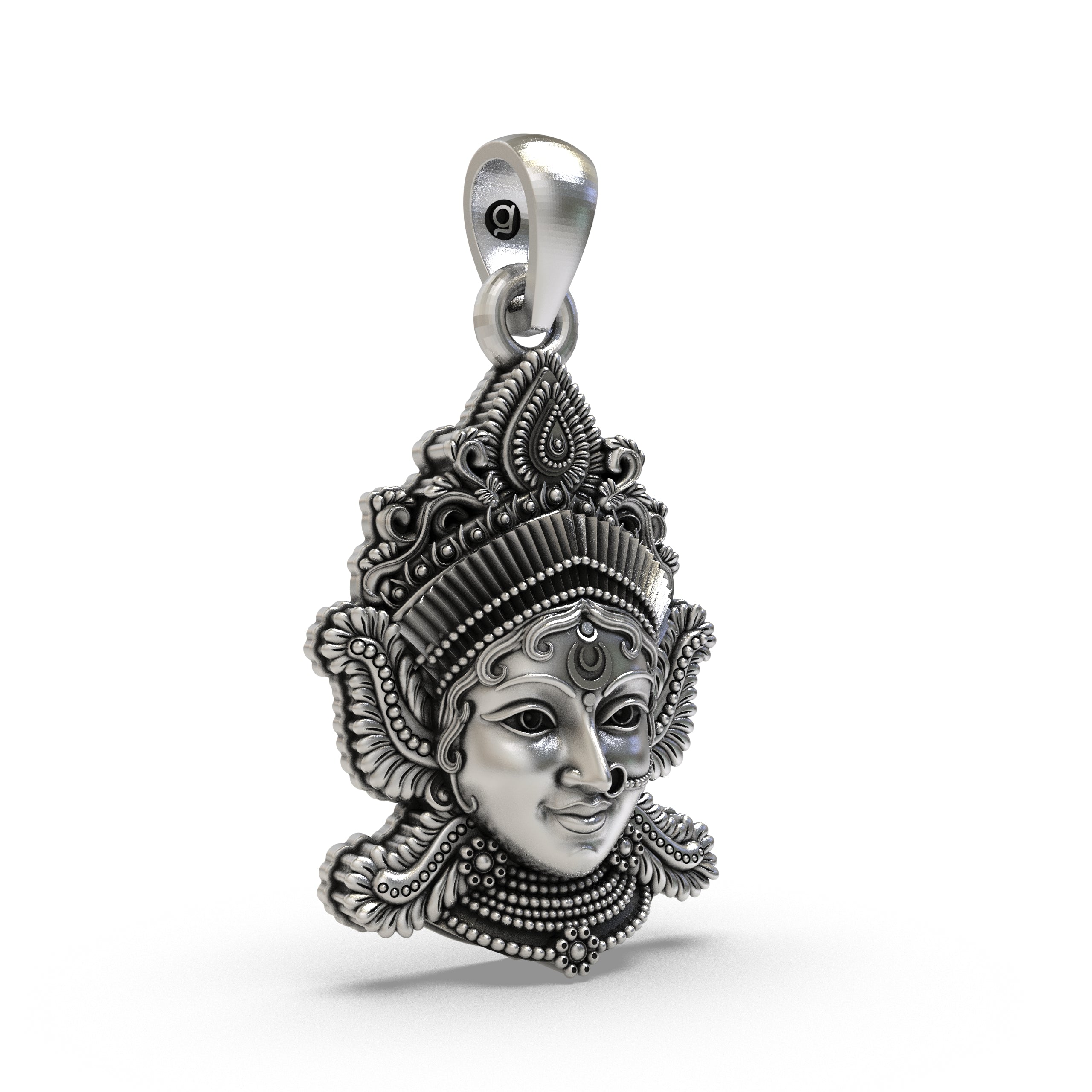 A detailed close-up shot of the Lakshmi Devi face pendant in 925 sterling silver with a beautiful antique finish.