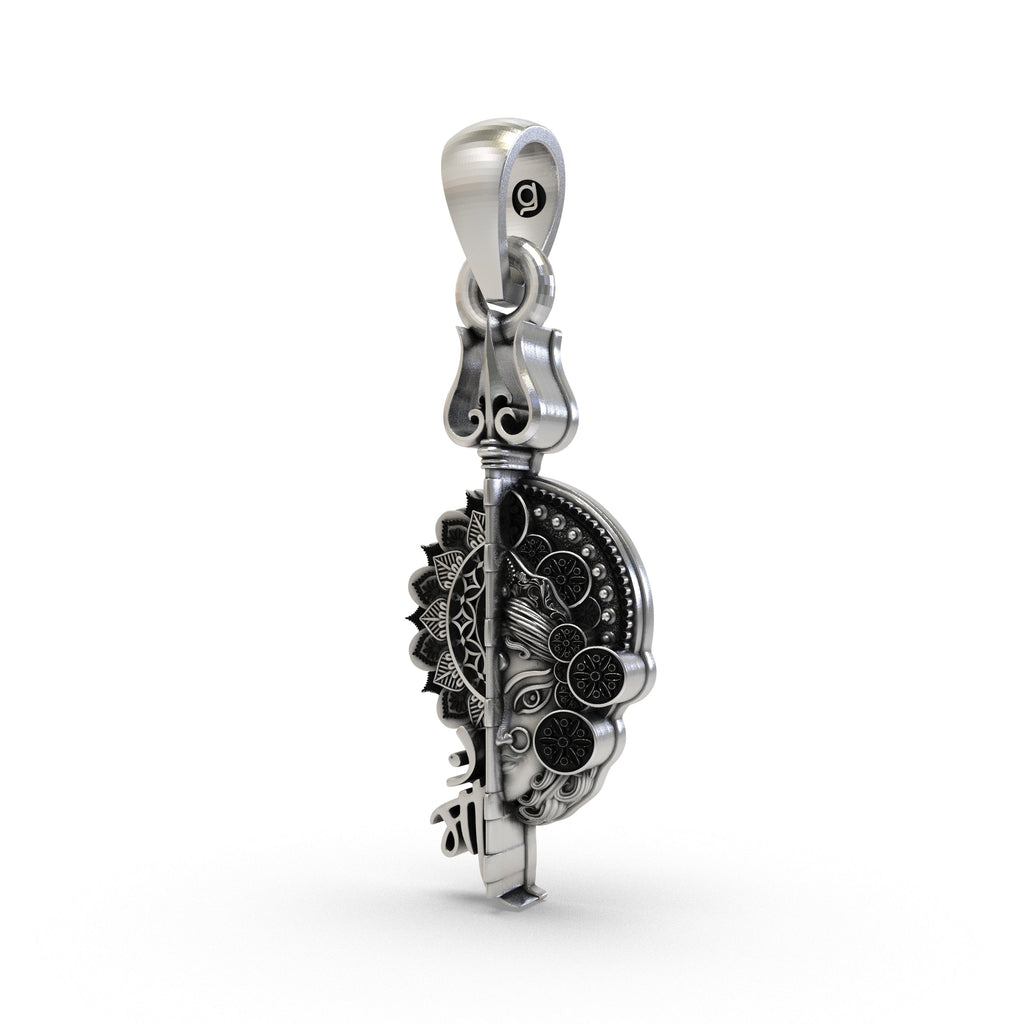 Angled side view of the handcrafted 925 sterling silver Maa pendant showcasing its dimensional design.
