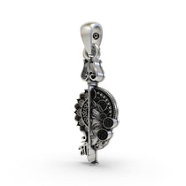 Angled side view of the handcrafted 925 sterling silver Maa pendant showcasing its dimensional design.