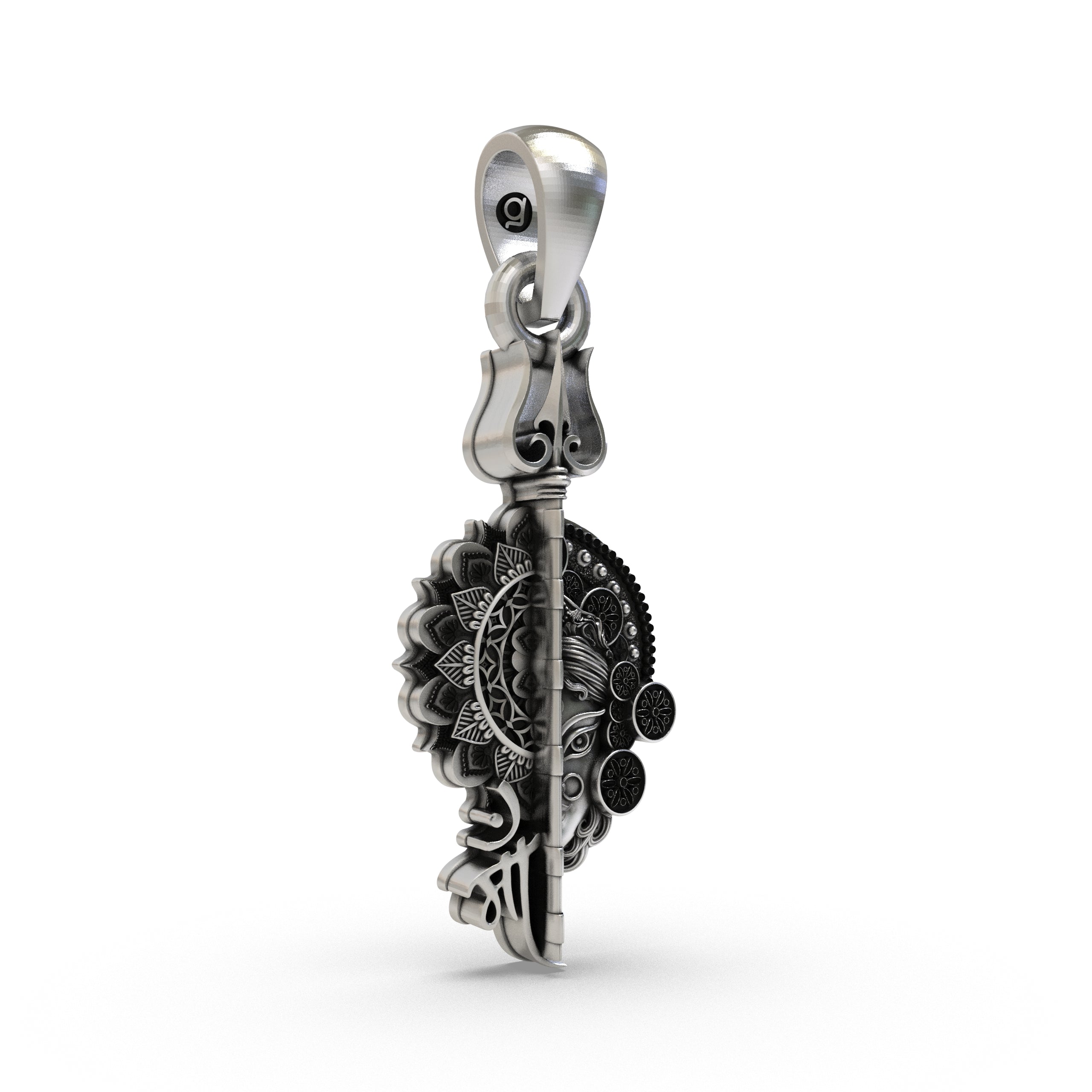 Close-up detail of the intricate craftsmanship on the oxidized 925 silver Maa goddess pendant.