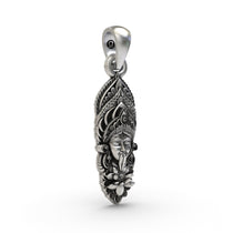 Detailed close-up of the Sterling Silver Kalimaa Face Pendant, focusing on the intricate silverwork and symbolic details.