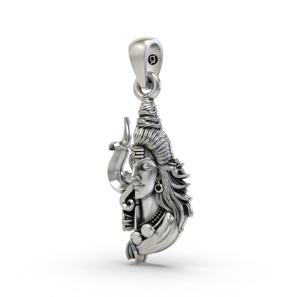 Angled shot of the oxidized 925 silver Shiva Trishul pendant highlighting the intricate details on the Mahadev face.