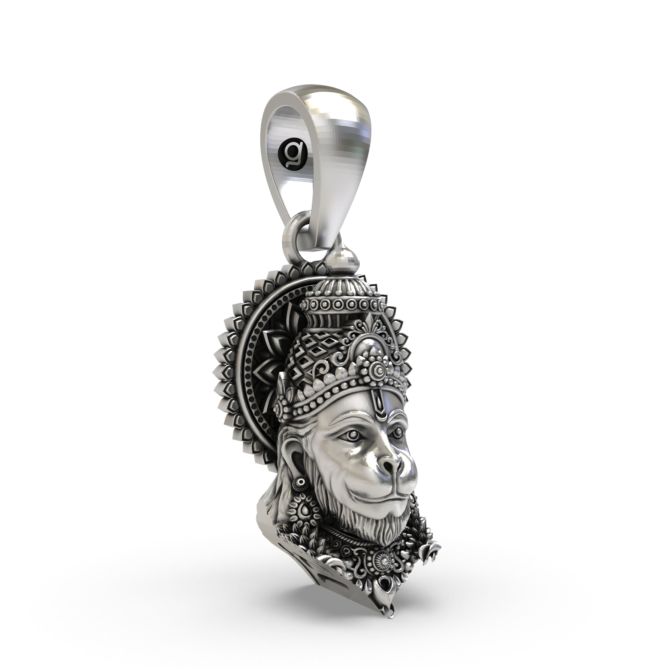 A close-up of the antique oxidized finish on the sterling silver Lord Hanuman pendant, showing intricate details.