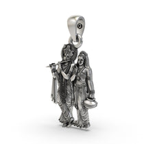 Angled view of the spiritual Radha Krishna pendant, showcasing the detailed craftsmanship in 925 sterling silver.