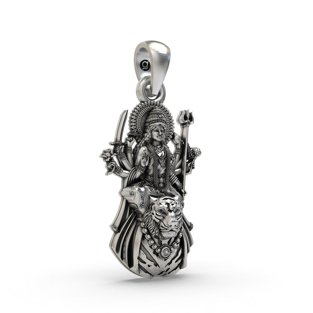 Close-up shot of the sterling silver Ambemaa Mata locket detailing the oxidized finish and sacred design.