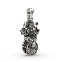 Close-up shot of the sterling silver Ambemaa Mata locket detailing the oxidized finish and sacred design.