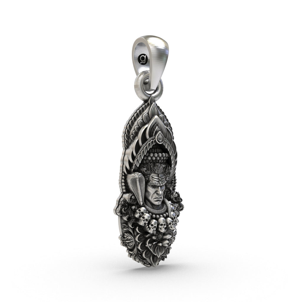Close-up shot of the sterling silver Mahadev pendant, focusing on the rustic oxidized finish and details.