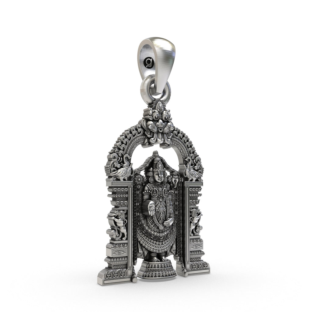 Close-up of the antique oxidized finish on the Tirupati Balaji silver pendant, showing the hollow back design for comfort.