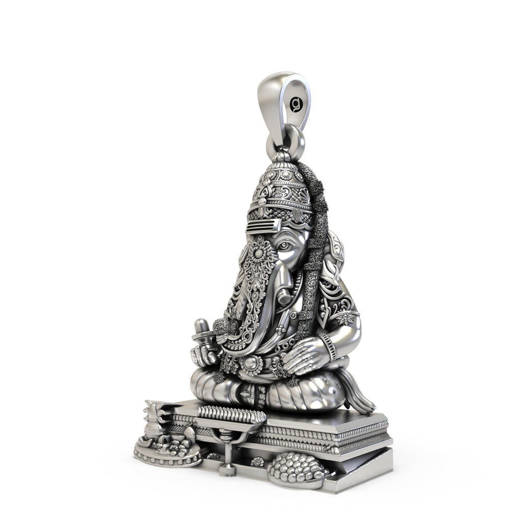 Angled side profile of the handmade Pillayarpatti Karpaga Ganesha pendant in 925 sterling silver from Alankar jewelry.