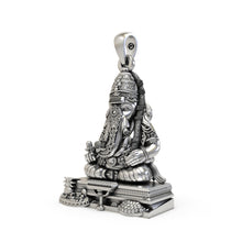 Angled side profile of the handmade Pillayarpatti Karpaga Ganesha pendant in 925 sterling silver from Alankar jewelry.