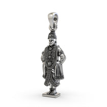 An angled perspective of the oxidized 925 silver Lord Vitthal pendant, highlighting its divine profile.