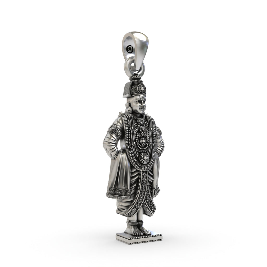 Close-up detail of the intricate carvings on the 925 sterling silver Vithoba pendant by Alankar.
