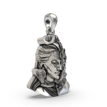 Close-up detail of the handmade half Shiva half Hanuman pendant in 925 sterling silver with an antique finish.