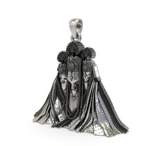 Angled side view of the Nalkheda Wali Mataji silver locket, showing the intricate craftsmanship and antique feel.