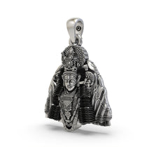 Close-up of the handcrafted 925 sterling silver Ashapura Maa goddess pendant showing fine carvings.