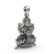Close-up macro shot of the 925 silver Lakshmi Maa pendant highlighting the fine craftsmanship and divine details.