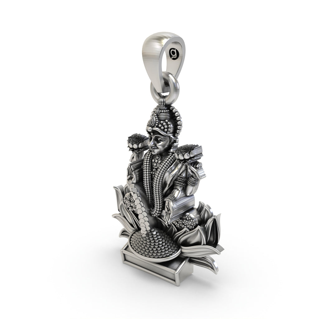 Close-up detail of the Lakshmi Maa spiritual pendant, focusing on the coin and lotus flower symbols.