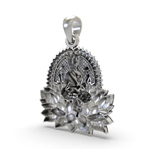 The serene face and form of Goddess Lakshmi on the lotus pendant, handcrafted from pure 925 sterling silver.