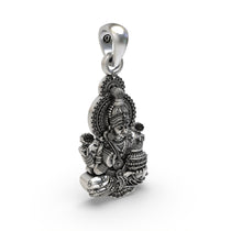 Side profile of the Hindu Goddess Lakshmi pendant in 925 silver, showcasing its three-dimensional design.