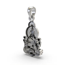 The Lakshmi Maa silver pendant shown with its bail, ready to be worn as a symbol of wealth and prosperity.