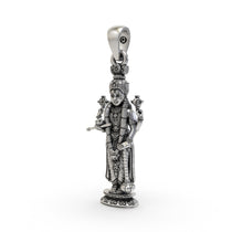 Close-up detail of the handcrafted silver Lord Vishnu pendant showing the Shankh and Chakra.