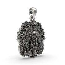 A close-up of the Lakshmi Maa temple pendant, showcasing the fine detailing and polished finish on the sterling silver.