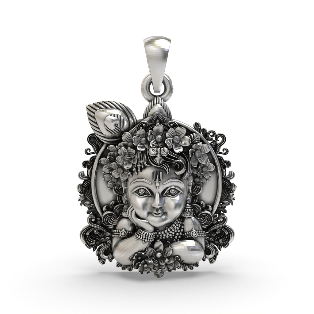 Front view of the handcrafted Bal Krishna face pendant in 925 sterling silver, showing his charming expression.