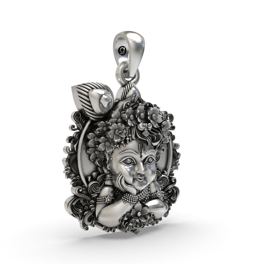 A detailed close-up of the Bal Krishna face pendant, showcasing the fine craftsmanship of the peacock feather.