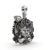 A detailed close-up of the Bal Krishna face pendant, showcasing the fine craftsmanship of the peacock feather.