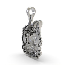 Top view of the Bal Krishna face pendant in sterling silver, displaying the sturdy bail for chain attachment.