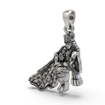 An angled profile of the spiritual Radha Krishna pendant, highlighting the detailed craftsmanship in pure 925 silver.