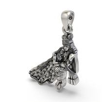 The back of the 925 sterling silver Radha Krishna pendant, showing the smooth polished finish and sturdy pendant bail.