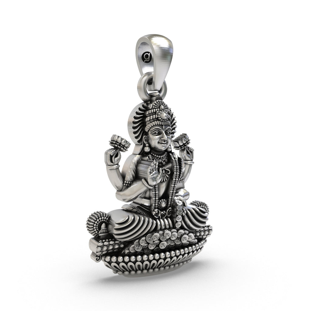 Close-up detail of the Lakshmi Maa pendant, showcasing the intricate craftsmanship on the 925 sterling silver.