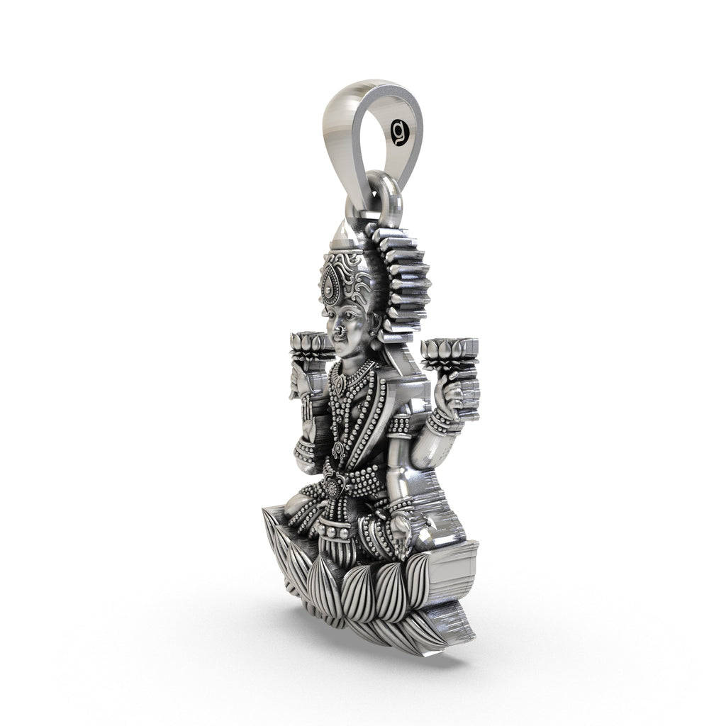Angled shot of the 925 silver Lakshmi Maa pendant, highlighting the intricate temple-style artistry and detailing.