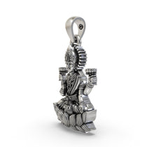 Angled shot of the 925 silver Lakshmi Maa pendant, highlighting the intricate temple-style artistry and detailing.