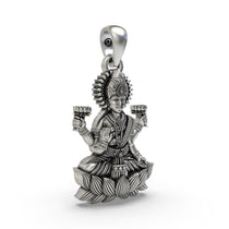A close-up view of the Lakshmi Maa silver pendant, showcasing the fine craftsmanship of the goddess's form.