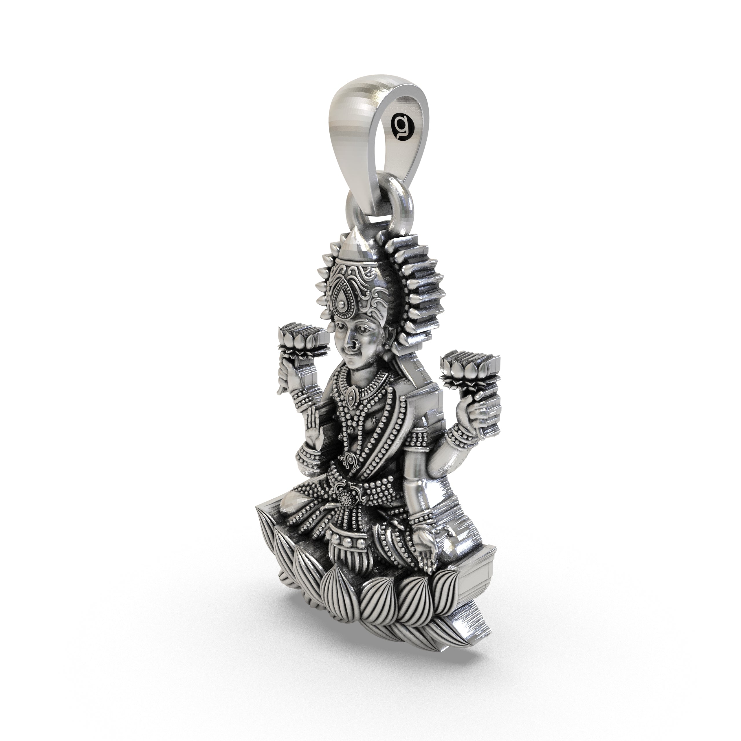 The sterling silver Lakshmi Maa pendant shown against a scale to display its 31mm size and beautiful finish.