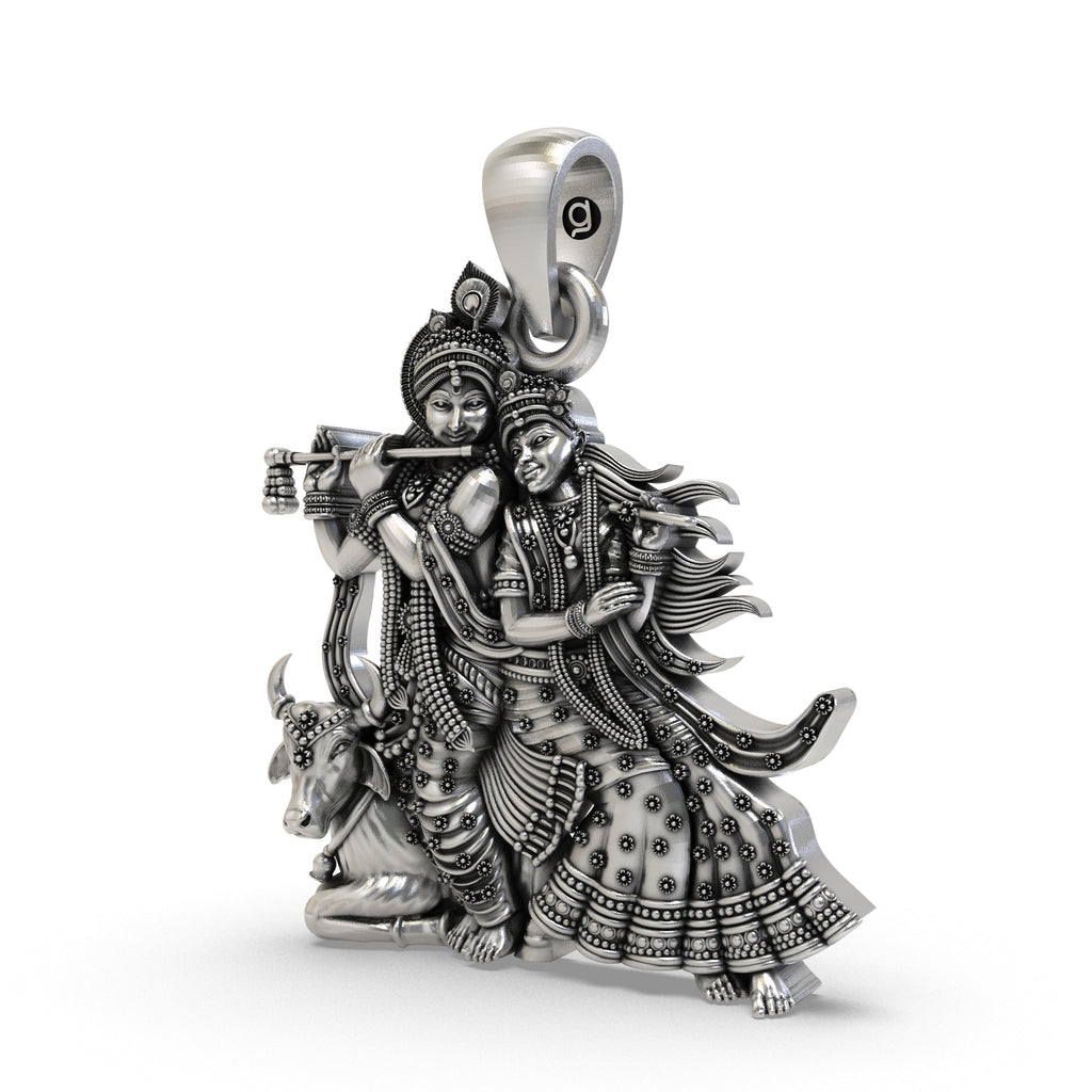 Detailed close-up of the 925 silver Radha Krishna pendant, highlighting the figures of Radha, Krishna, and the cow.