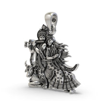 Detailed close-up of the 925 silver Radha Krishna pendant, highlighting the figures of Radha, Krishna, and the cow.