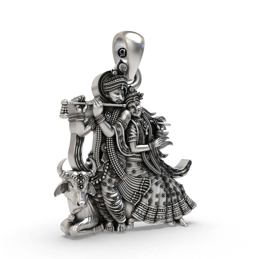 Angled side profile of the divine Radha Krishna with Cow pendant, showcasing its temple-style artistry in sterling silver.