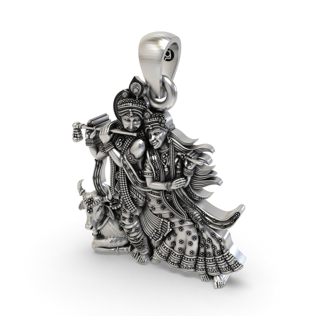 The 925 sterling silver Radha Krishna and Cow pendant with an antique oxidized finish, showing its spiritual design.