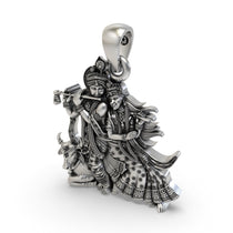 The 925 sterling silver Radha Krishna and Cow pendant with an antique oxidized finish, showing its spiritual design.