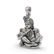 Close-up of the handcrafted Laddu Gopal silver pendant highlighting the Makhan Chor design and finish.