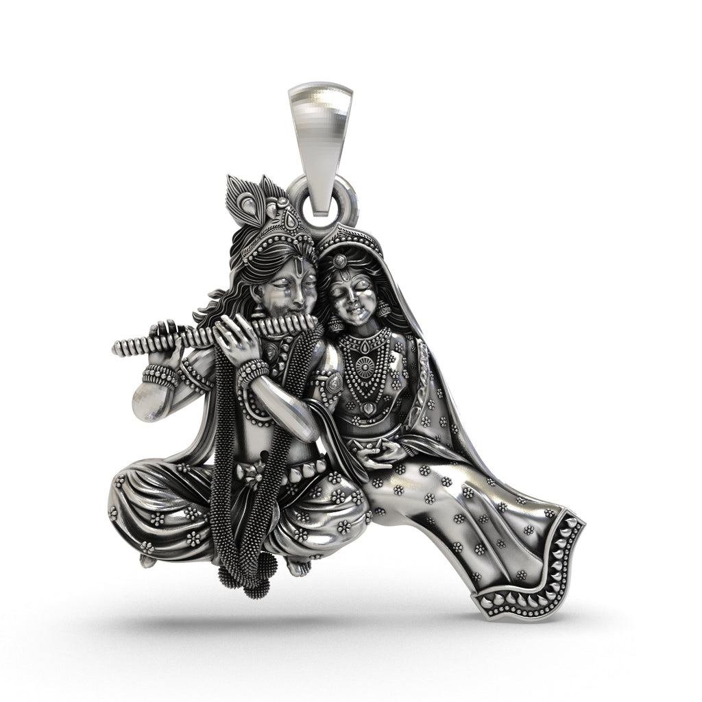 Front view of the handcrafted Radha Krishna silver pendant, showing Lord Krishna playing the flute in 925 sterling silver.