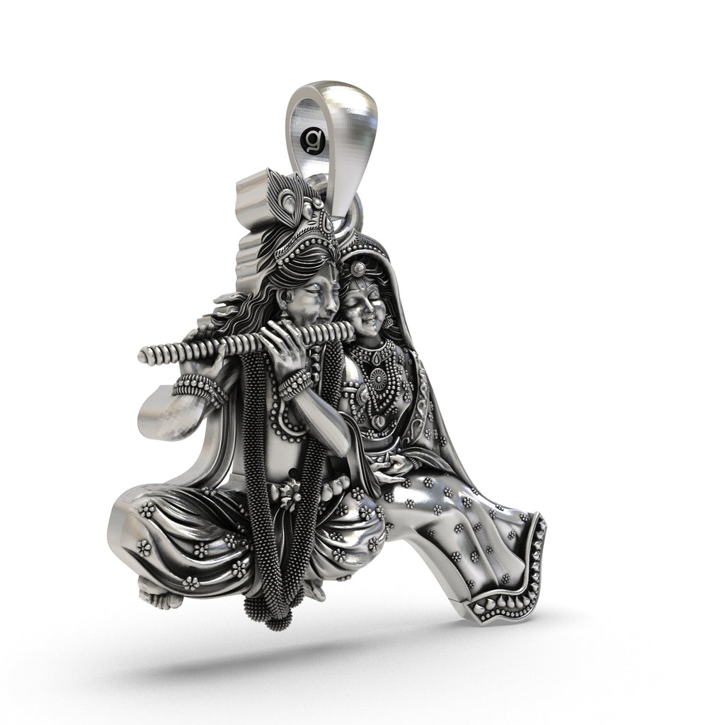 Angled side profile of the 925 sterling silver Radha Krishna pendant, showcasing its dimensional design and polished finish.