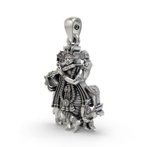 Angled view of the Lord Krishna spiritual pendant in 925 silver, highlighting the intricate temple-style details.