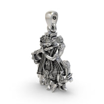 Side profile of the 925 sterling silver Krishna pendant, displaying its depth and three-dimensional artistic features.
