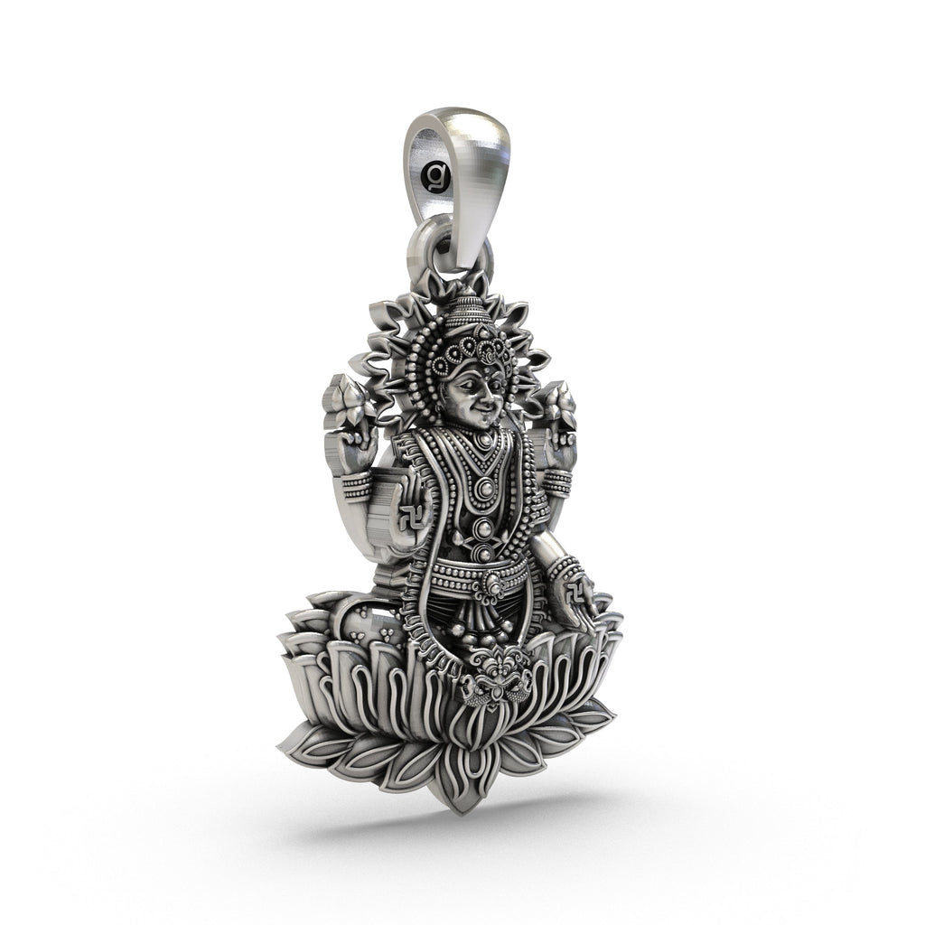 Close-up detail on the face and blessings of the Goddess Lakshmi Maa pendant, showcasing the fine 925 silver craftsmanship.