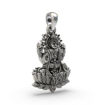 Close-up detail on the face and blessings of the Goddess Lakshmi Maa pendant, showcasing the fine 925 silver craftsmanship.